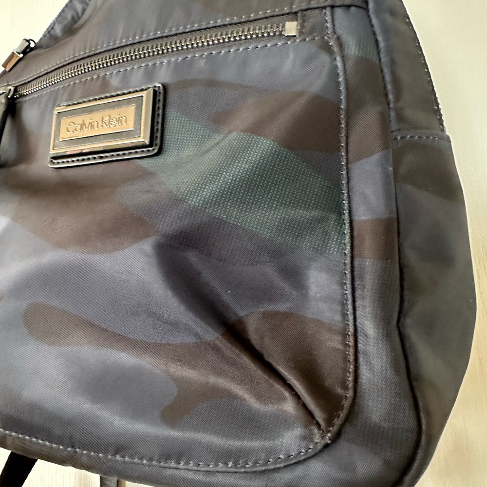 Calvin Klein Georgina Purse/Backpack camouflage design. EUC